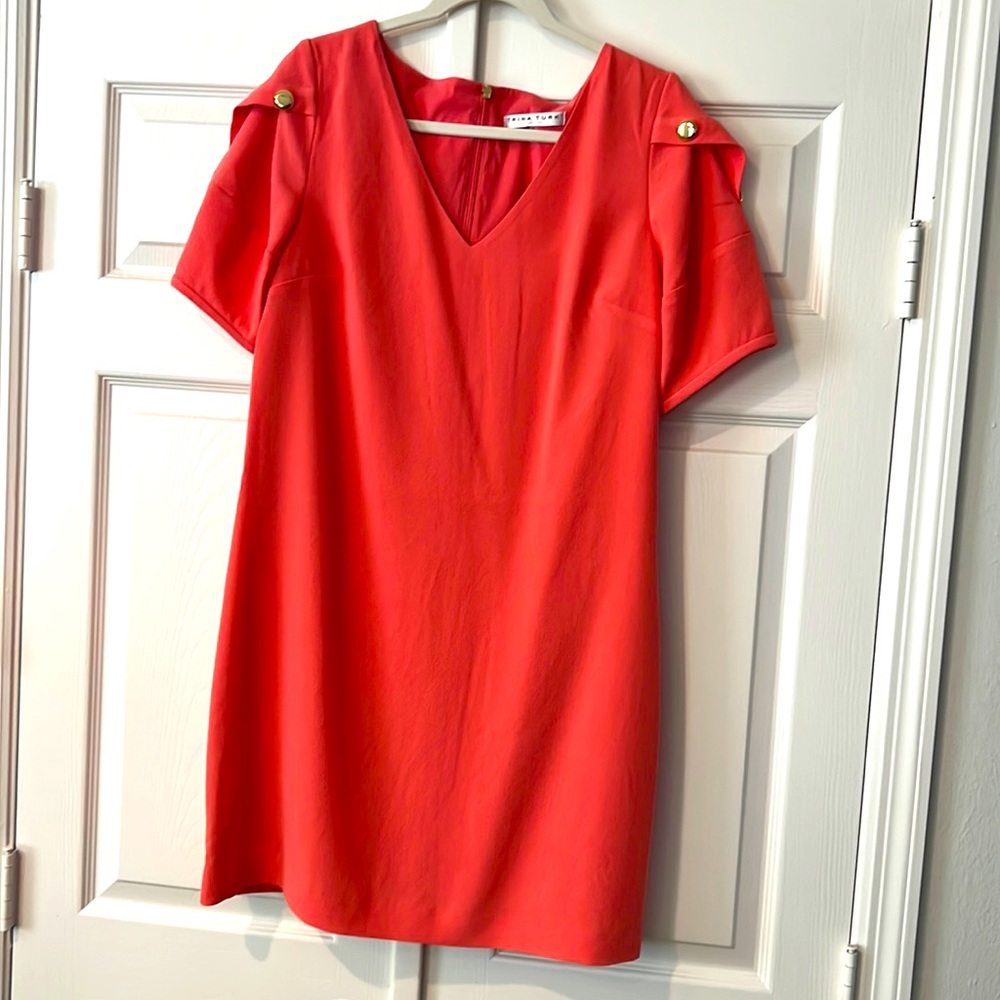 Trina Turk Lemonade dress with gold tone button accents.